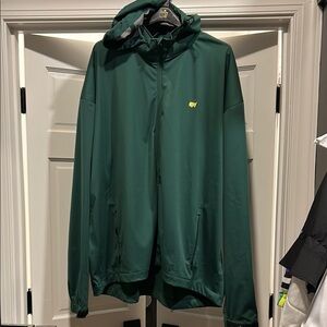 Masters Green Raincoat Sleek Design Logo Detail